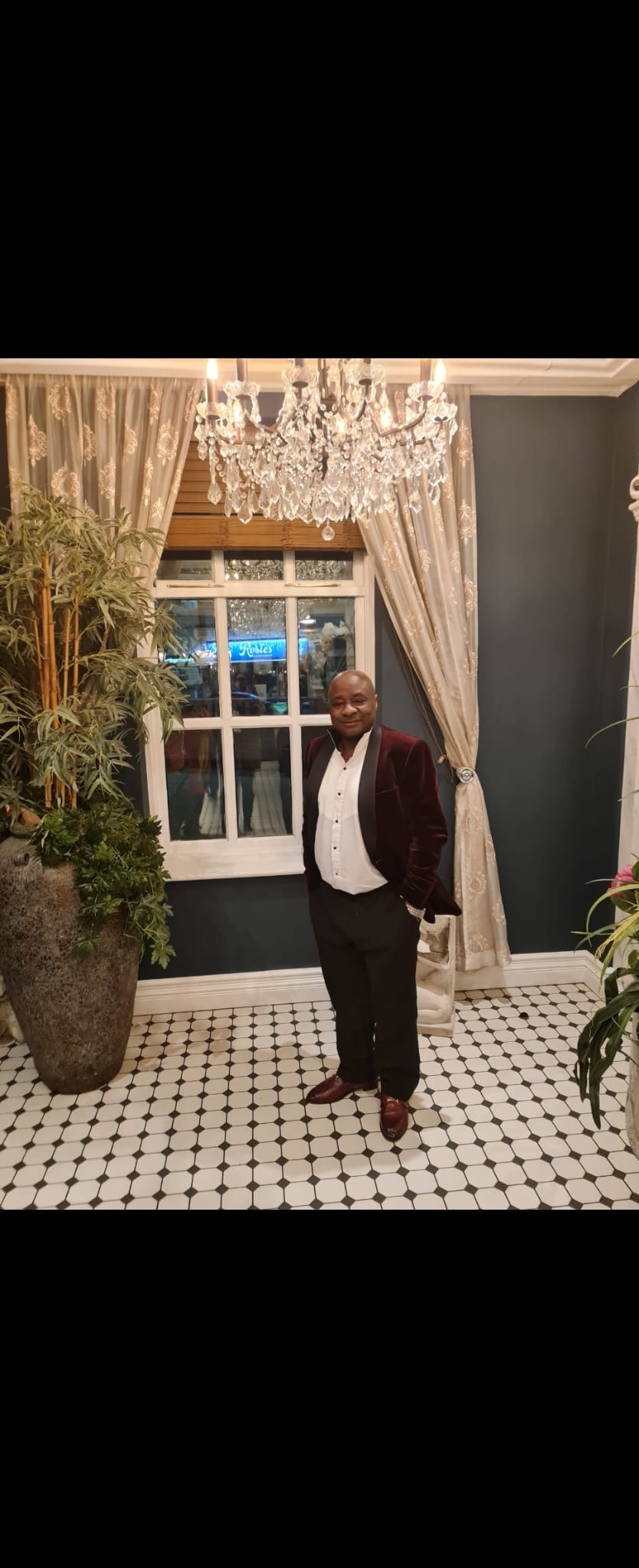 Ivo dressed elegantly in a velvet blazer